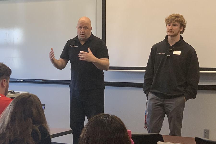 Spencer Engelman, left, and Paul Janicek talked with Northwest business students on Monday about the opportunity to receive a DocuLock franchise through a partnership with Northwest. (Northwest Missouri State University photo)